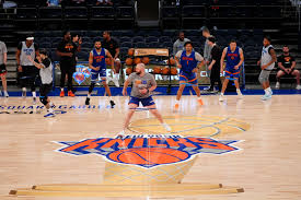 Bloomberg unharmed after Knicks guard dives into courtside seats