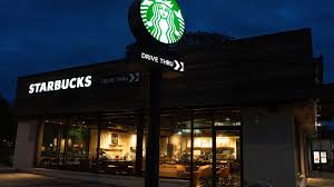 Starbucks lifts outlook after stronger traffic, sales growth